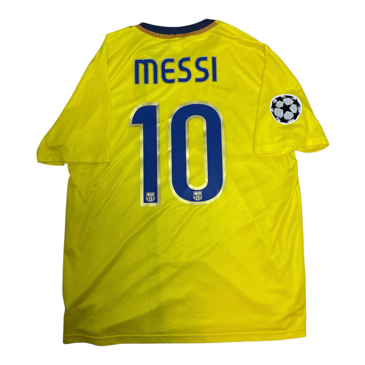 Trikodinho FC Barcelona Auswärtstrikot von Lionel Messi in Gelb mit Nummer 10 und Champions League Badge auf dem Rücken